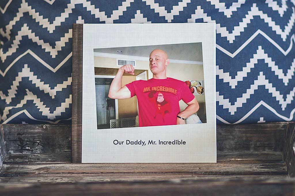 shutterfly album digital book fathers day gift ideas for dad with flexing on cover mr incredible t shirt pink in front of pillow display by danielle jacqueline photography in memphis tennessee