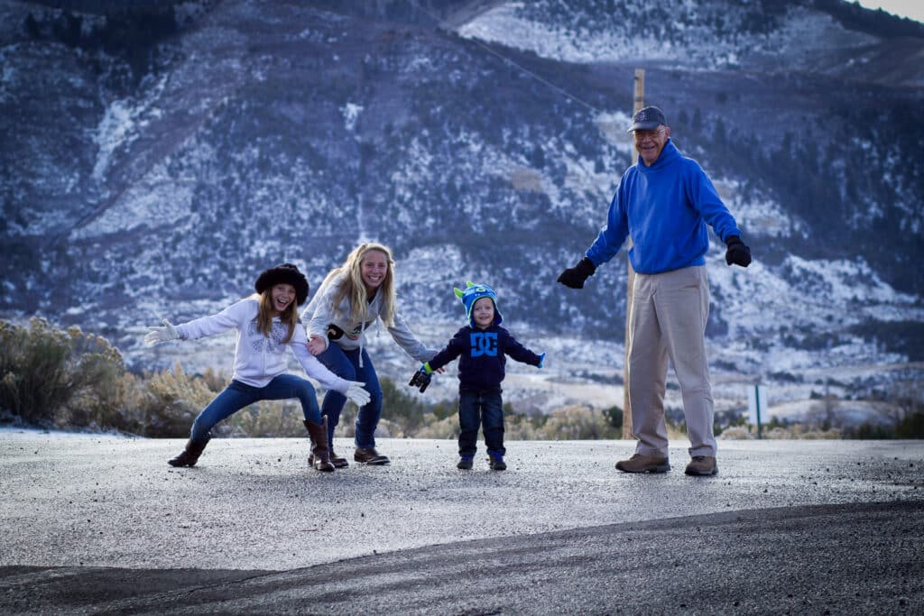 colorado family trip during thanksgiving break kids with grandpa on road snowfall mountains parachute grand rapids