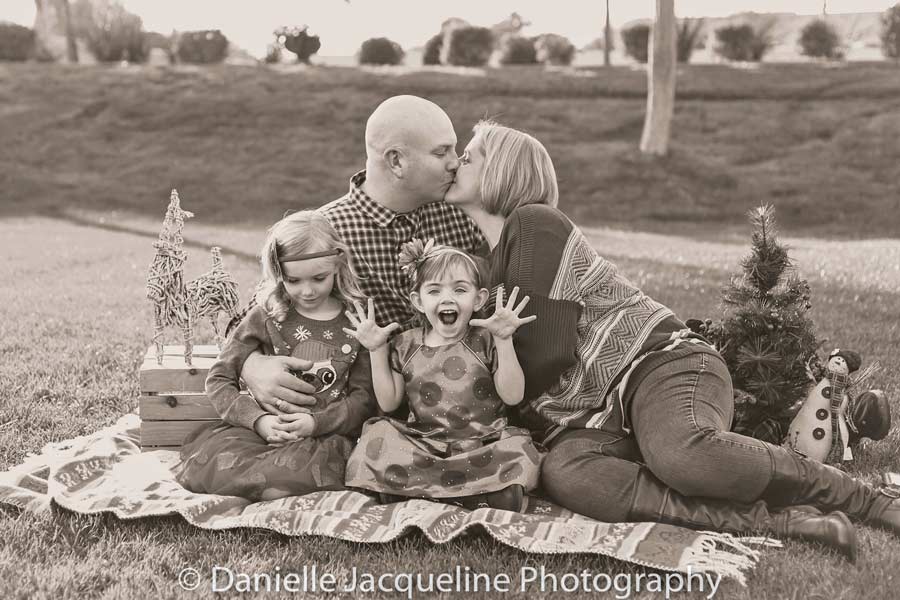 amazing family getting pictures taken after daughter beat cancer to celebrate holiday season and send out christmas cards photography by danielle jacqueline located in desoto county mississippi