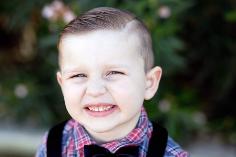 funny faces by preschool boys wearing bow tie and great hair style natural candid moments of kids by danielle jacqueline photography in memphis area north mississippi