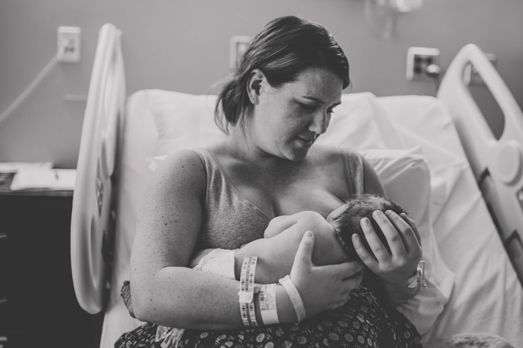 amazing photography moment of first time mother with her child in the hospital room super vulnerable in awe of giving birth black and white portrait danielle jacqueline south memphis tn stateline