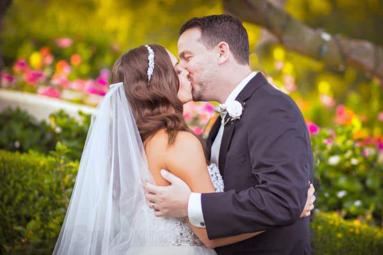 beautiful wedding with newly married couple confirming vows and i do with a kiss photo by danielle jacqueline in southeast memphis olive branch ms