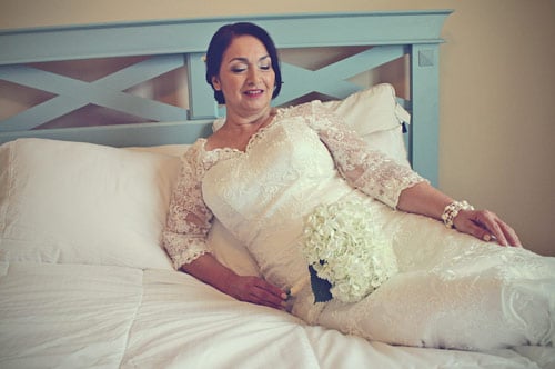 aging wife married for 30 years in original wedding dress for anniversary portraits by danielle jacqueline photography teal bed frame family gathering white attire reviews