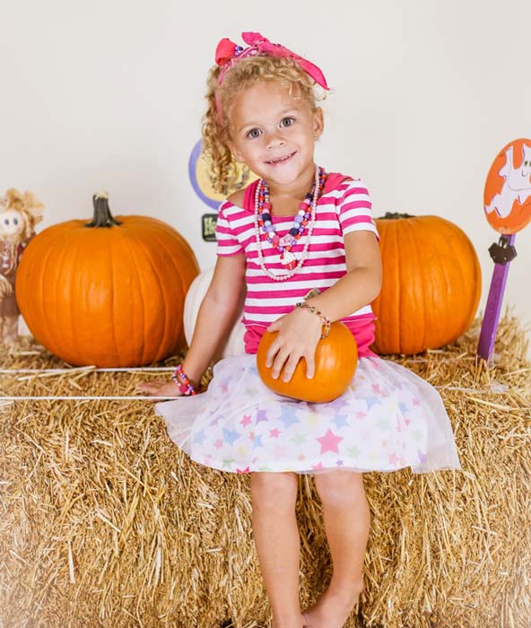 pumpkin patch studio portrait theme by danielle jacqueline adorable little girls striped pink t shirt curls