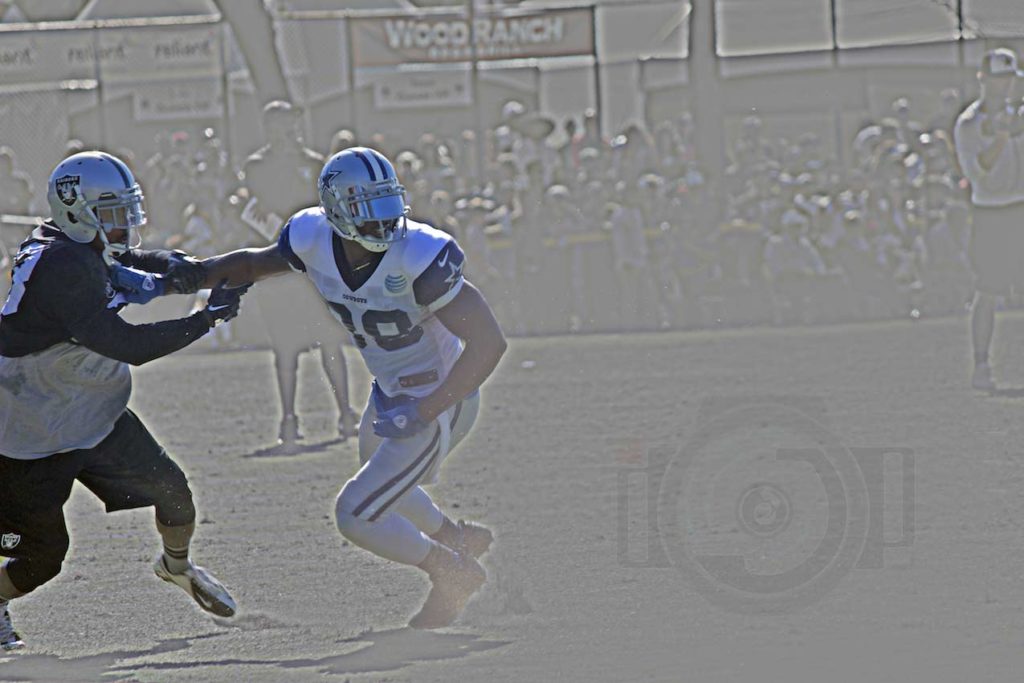 former cowboys all pro during joint practice against raiders press access by professional photographer for football players brand in desoto county ms