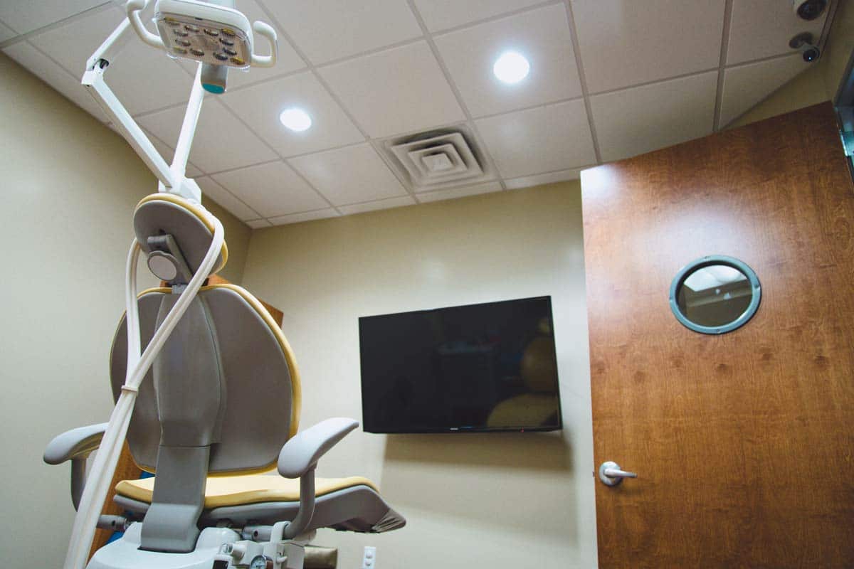 child's point of view photographer at local pediatric dentistry location for website pictures by danielle jacqueline door open ship window and spotlights facing large television for patients near southaven mississippi