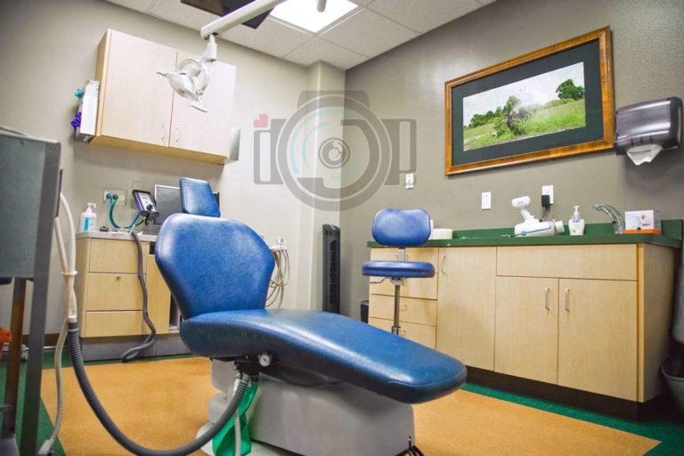 a child's perspective at the dentist as they walk into private room with big blue chair and medical equipment everywhere captured by danielle jacqueline photography for website photos pediatrician