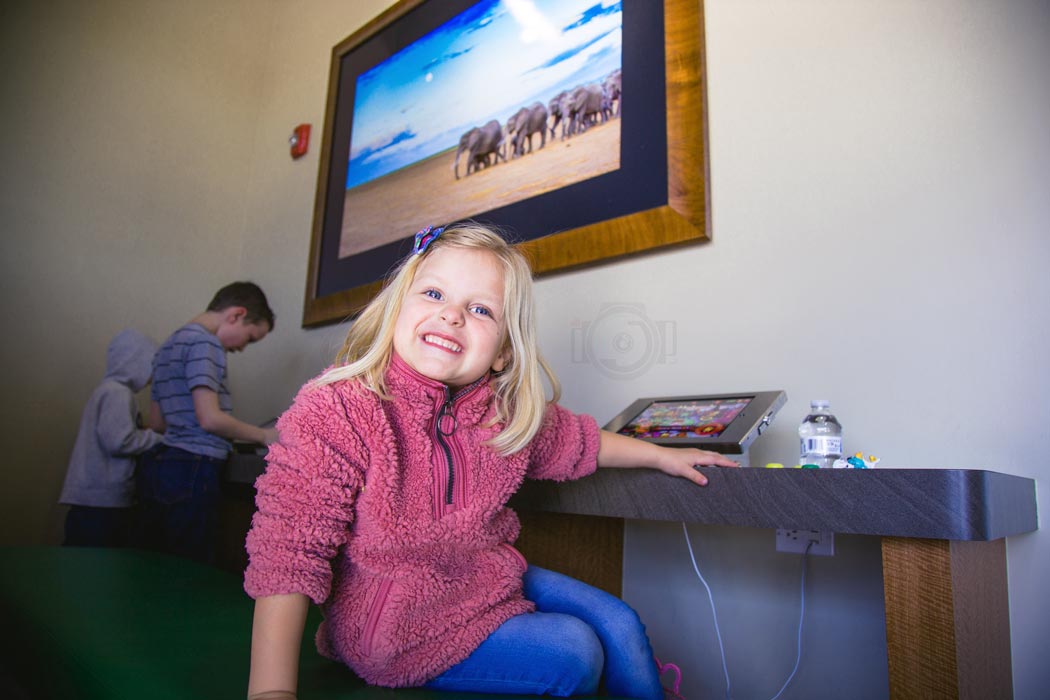 big smiles by dental location during pediatric session with kid's photographer near memphis tennessee