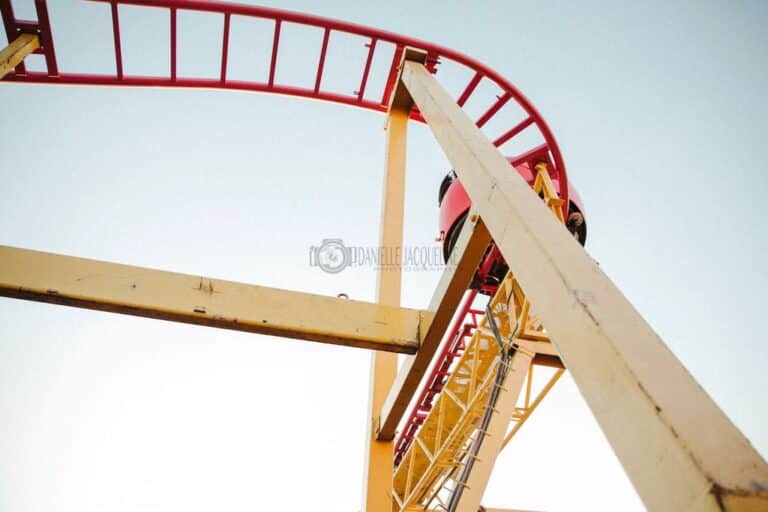 looking up at beams and rails for roller coaster at local fair event photographer midsouth danielle jacqueline crazy mouse tracks