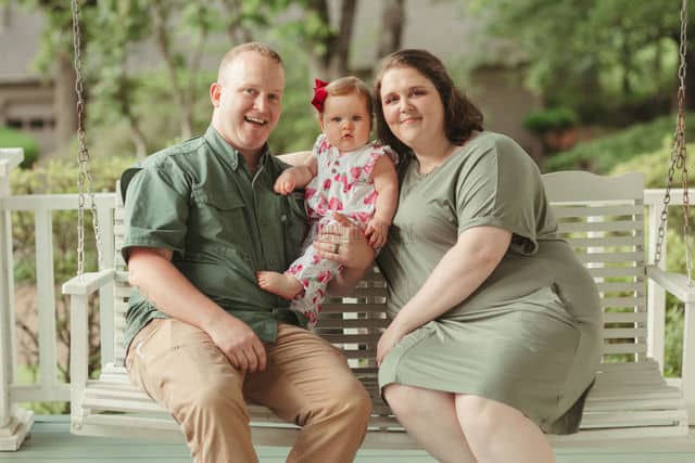 mississippi white porch swing light green decking young family photo one year old birthday danielle jacqueline photography near memphis tennessee